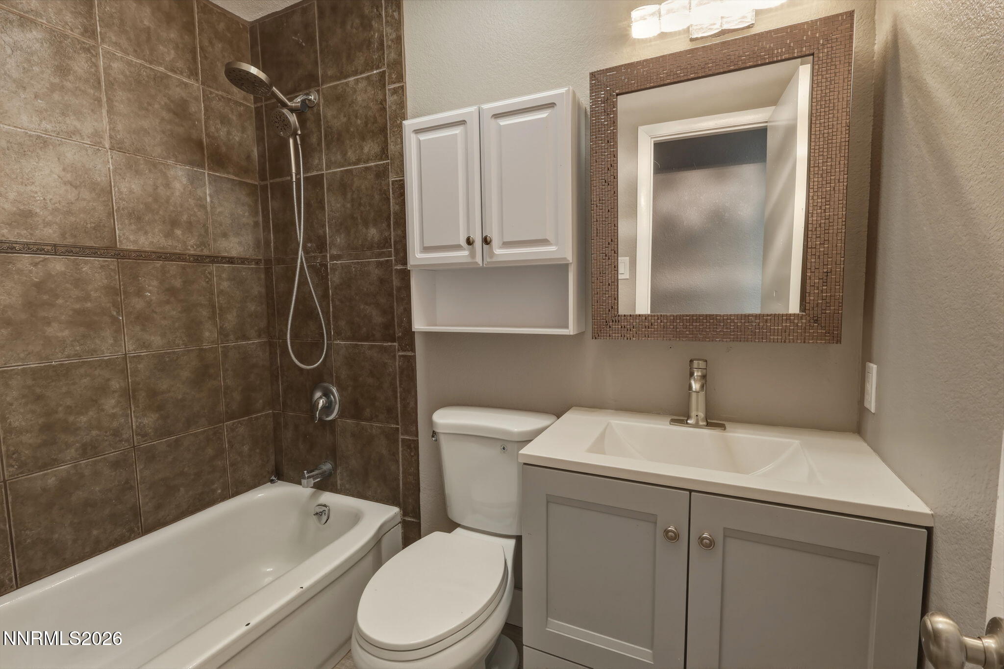 3260 Heights Drive Reno, NV 89503 - Photo 32 of 40 a bathroom with a sink toilet and shower