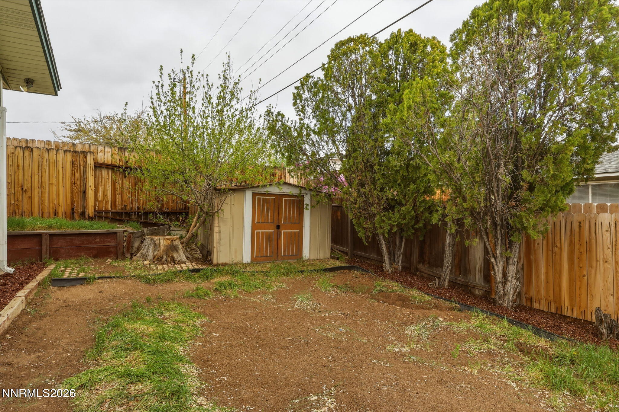 3260 Heights Drive Reno, NV 89503 - Photo 38 of 40 a view of a house with a yard and large tree