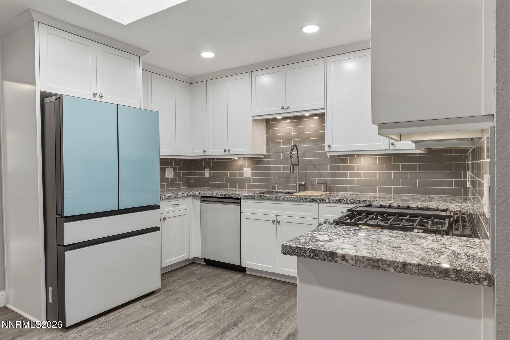 3260 Heights Drive Reno, NV 89503 - Photo 6 of 40 a kitchen with granite countertop cabinets and steel stainless steel appliances