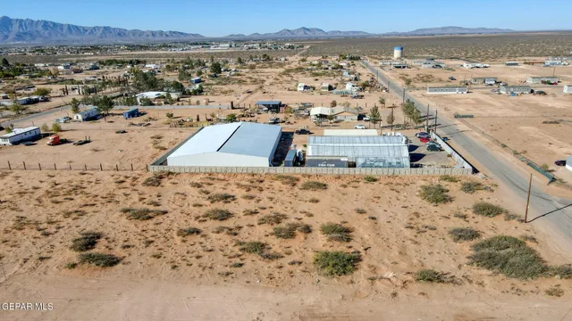 a view of an ocean beach and mountain