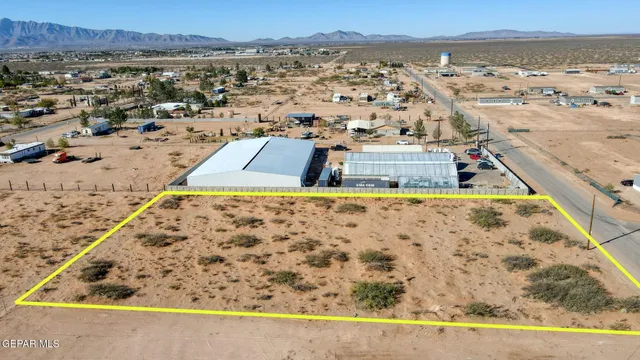 an aerial view of beach and ocean