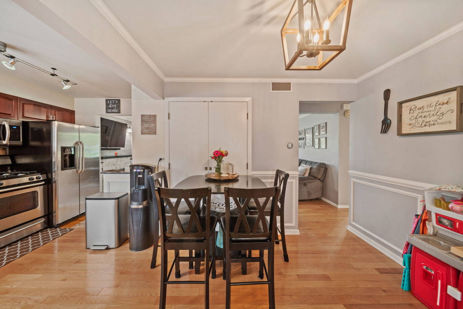 8243 Washington Street Niles, IL 60714 - Photo 11 of 30 a view of a dining room with furniture and wooden floor