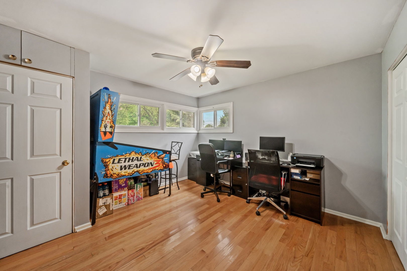 8243 Washington Street Niles, IL 60714 - Photo 12 of 30 a view of a workspace with furniture and a window