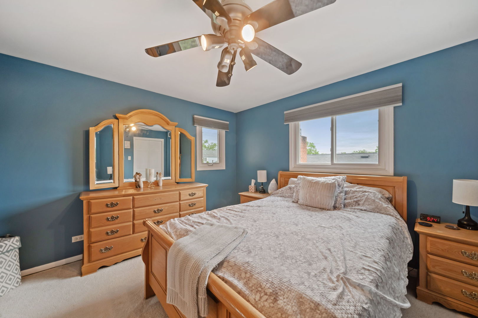 8243 Washington Street Niles, IL 60714 - Photo 15 of 30 a bedroom with a bed and a dresser