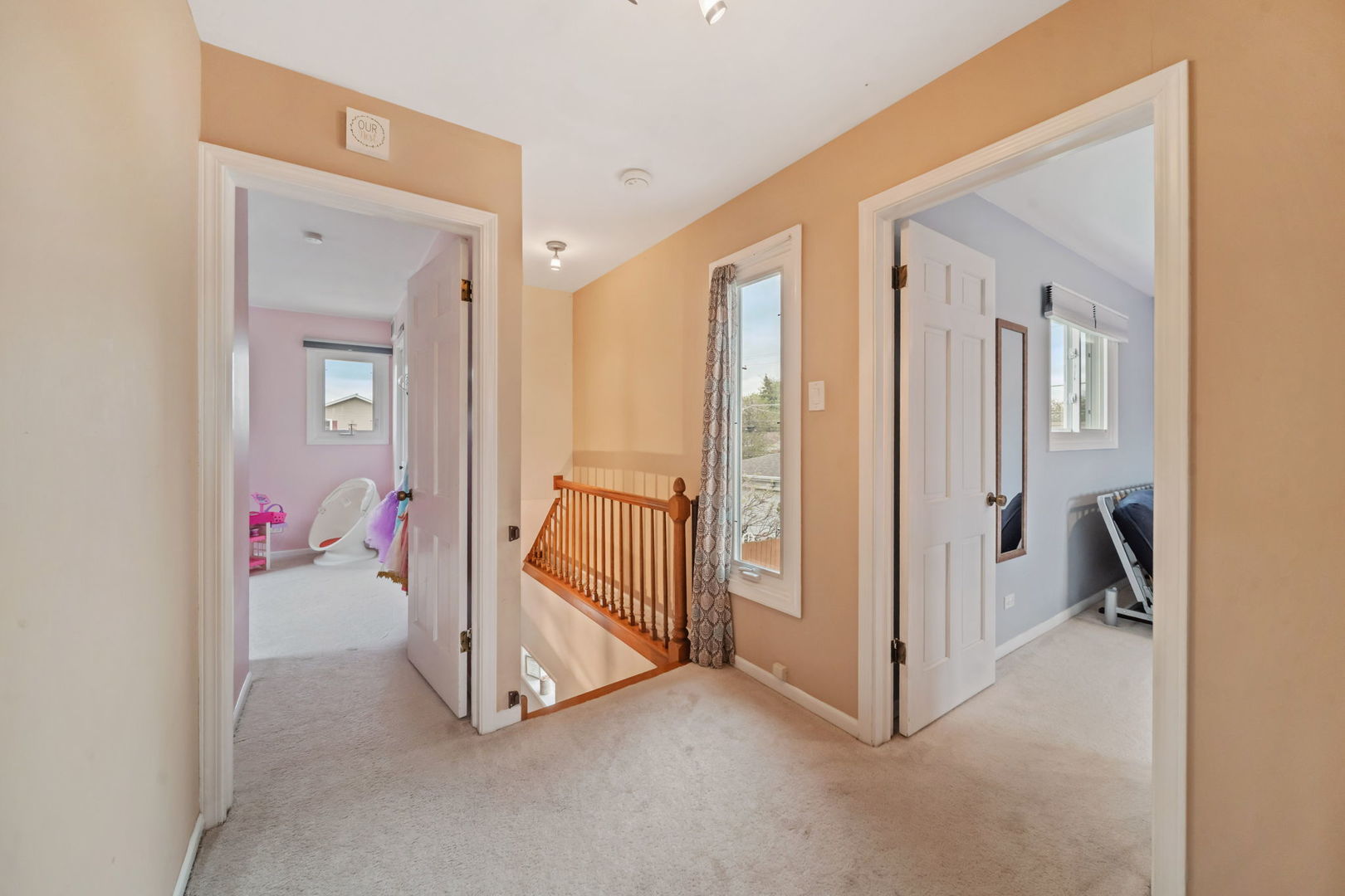 8243 Washington Street Niles, IL 60714 - Photo 21 of 30 a view of a livingroom with wooden floor and windows