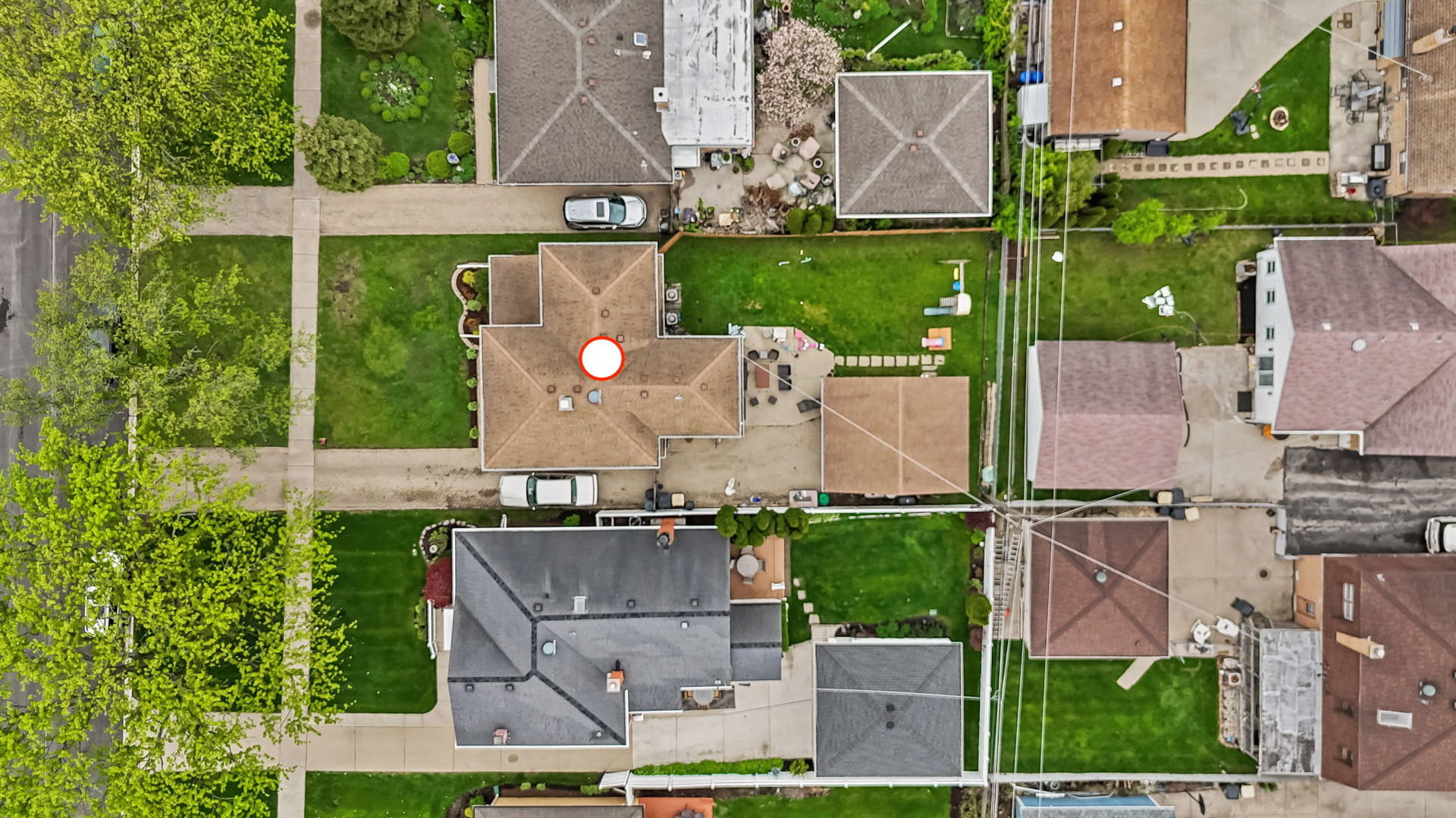 8243 Washington Street Niles, IL 60714 - Photo 27 of 30 an aerial view of a house with a garden and a yard