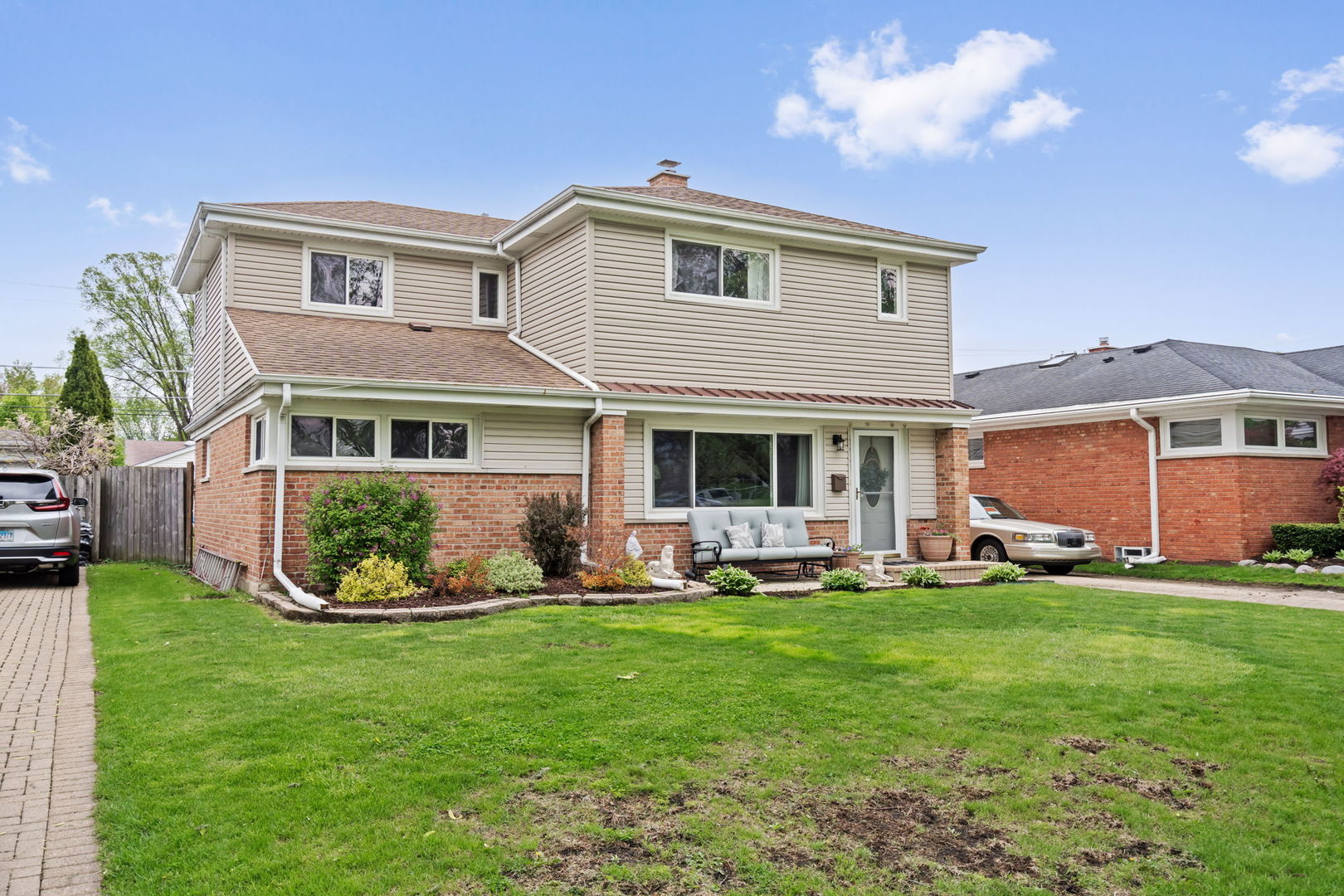 8243 Washington Street Niles, IL 60714 - Photo 30 of 30 a front view of house with yard and green space