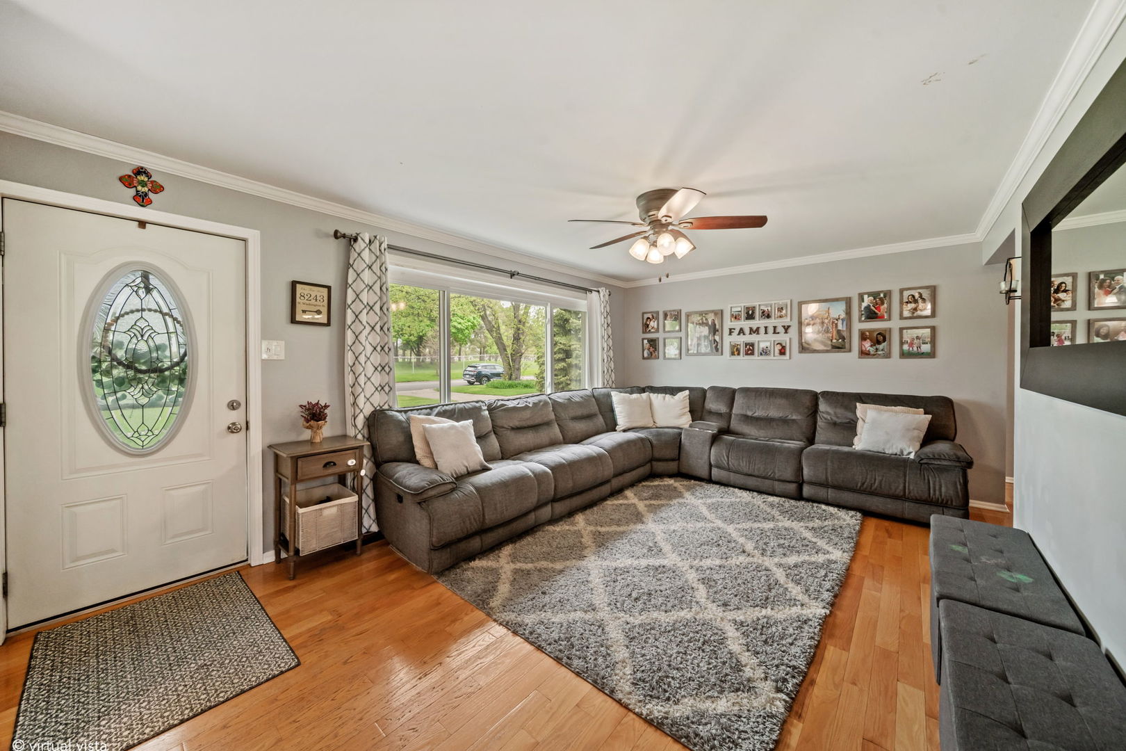 8243 Washington Street Niles, IL 60714 - Photo 4 of 30 a living room with furniture and a large window