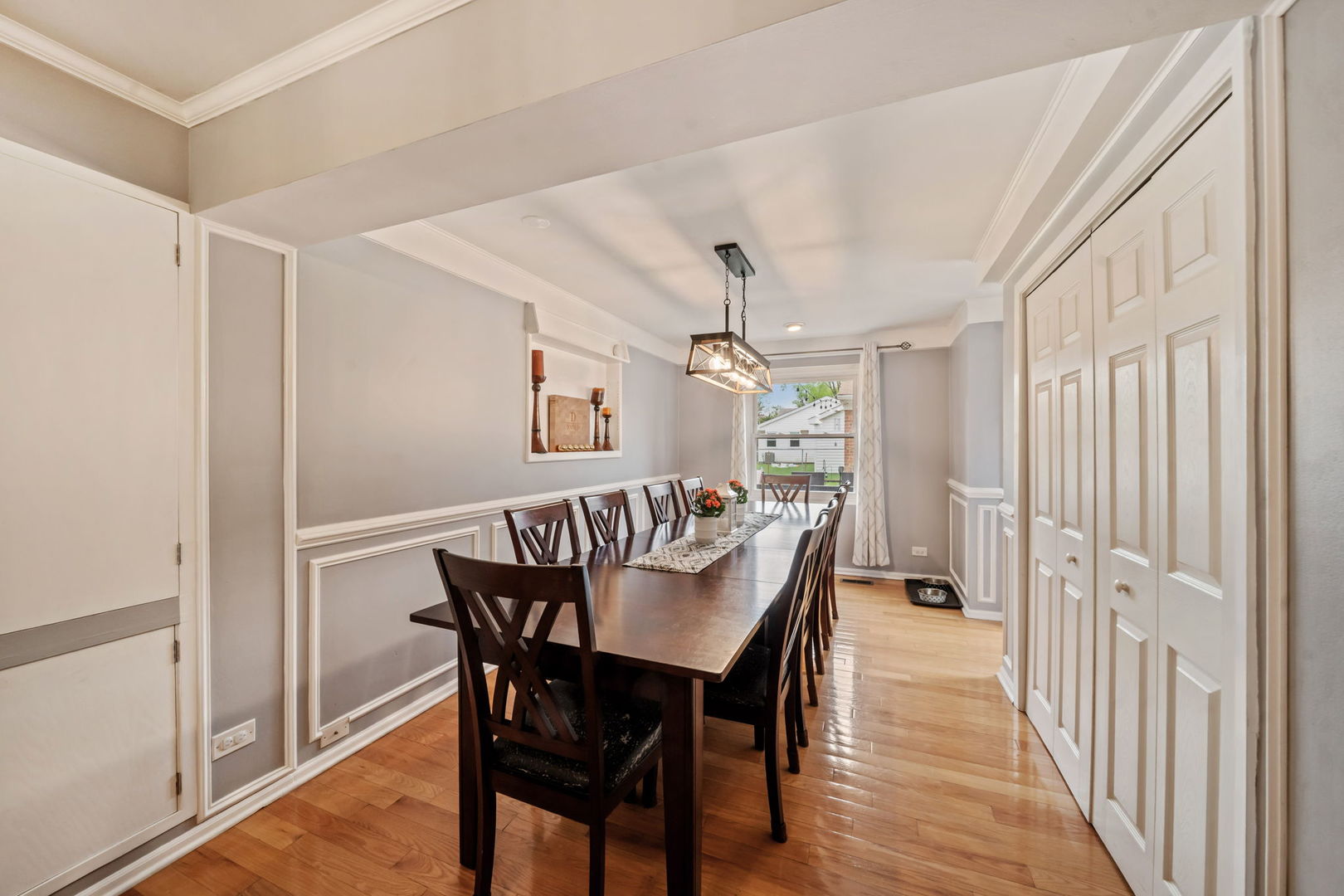 8243 Washington Street Niles, IL 60714 - Photo 6 of 30 a view of a dining room with furniture and wooden floor