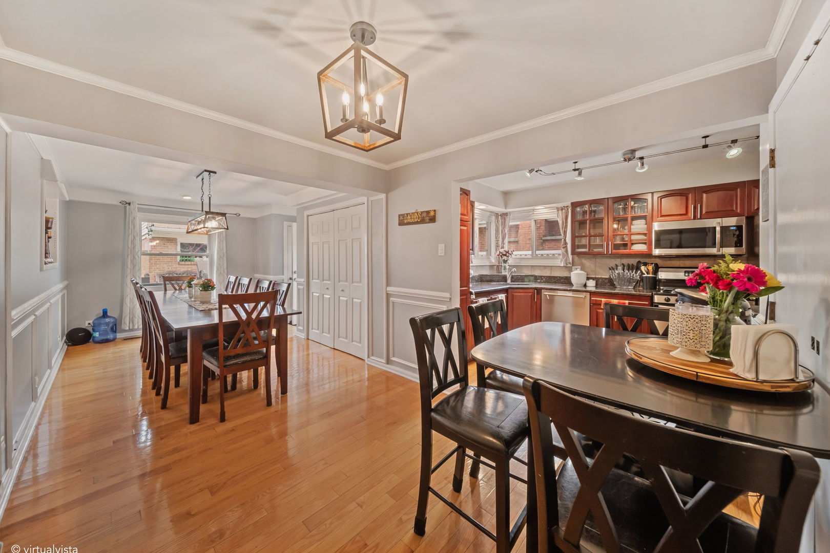 8243 Washington Street Niles, IL 60714 - Photo 9 of 30 a view of a dining room with furniture and wooden floor