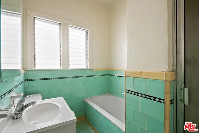 a bathroom with a sink and a bathtub