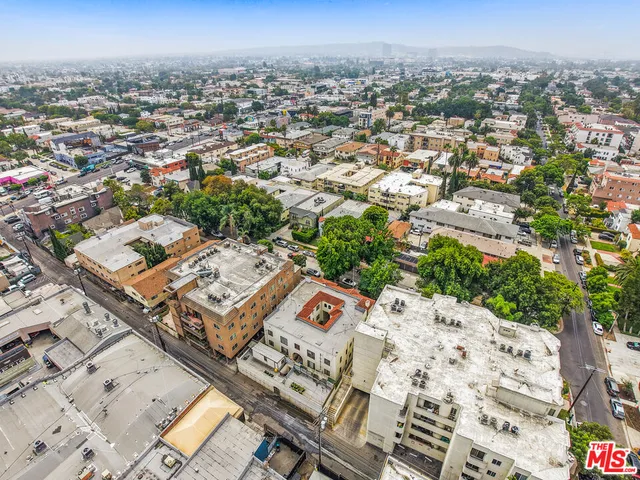 an aerial view of a city with lots of residential buildings