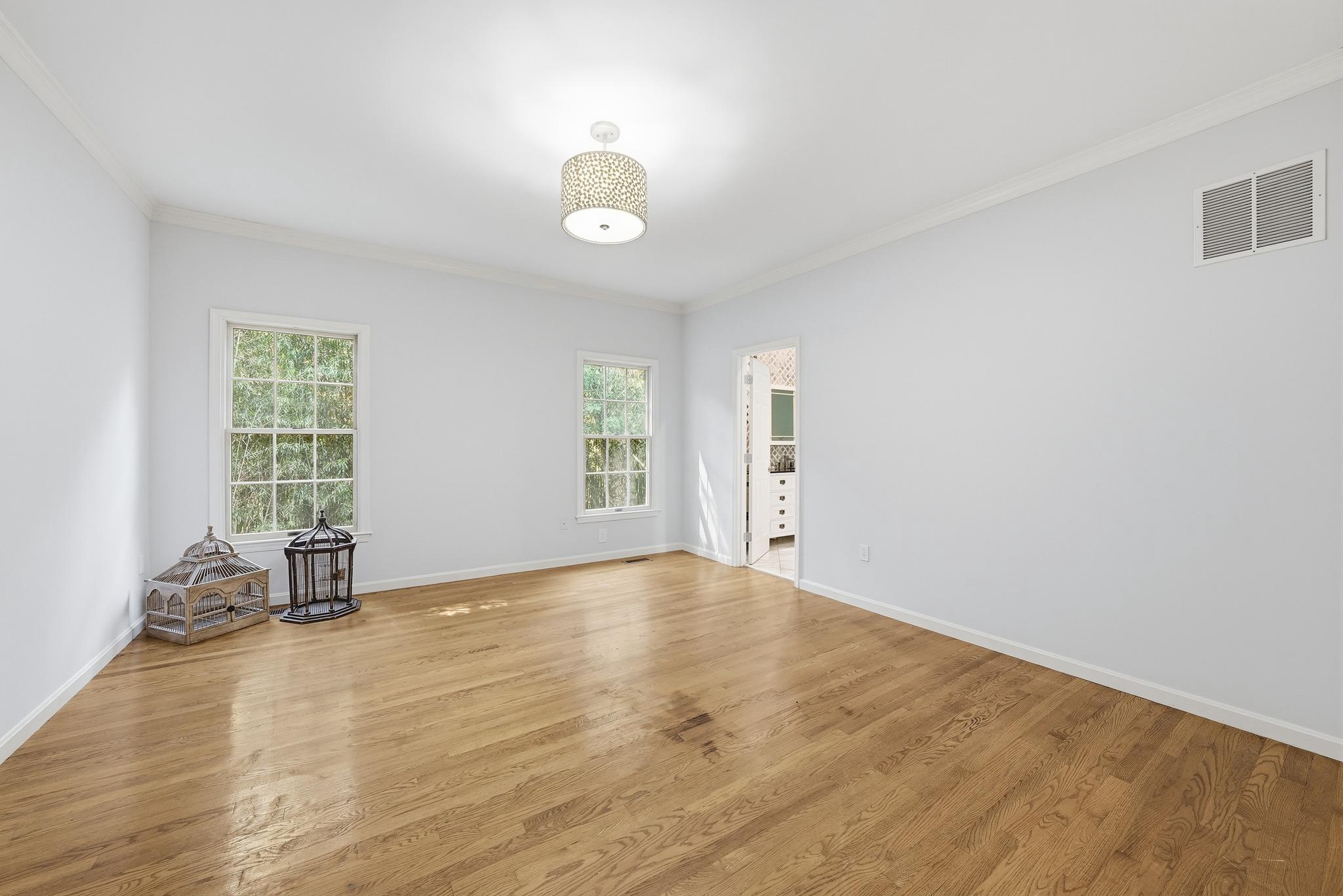 15802 Radwick Lane Silver Spring, MD 20906 - Photo 15 of 53 Primary Bedroom on Main Level with Hanging Light