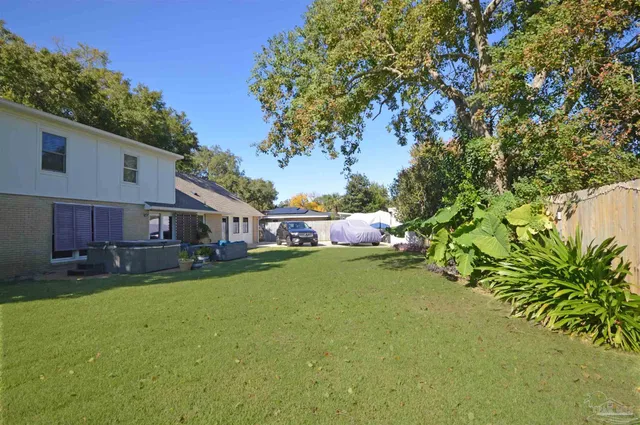 a house view with a garden space