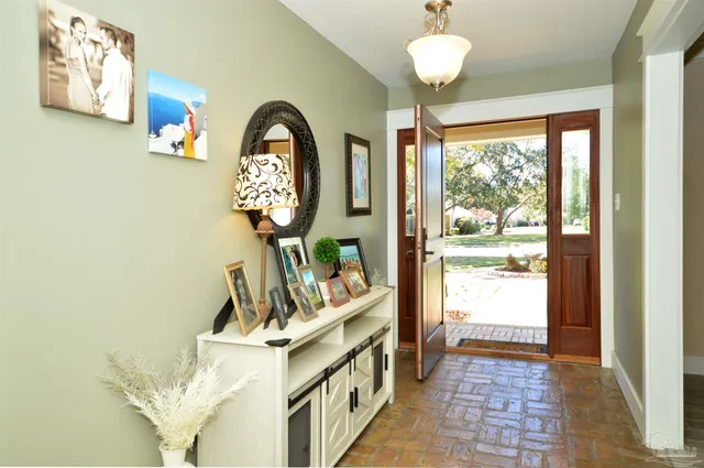 a view of a hallway with windows