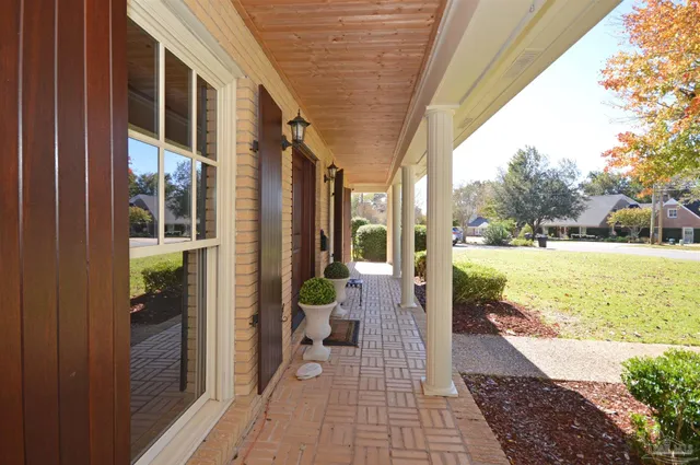 a view of swimming pool with seating space