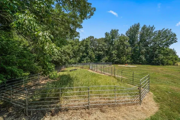 a view of a wooden floor with a yard