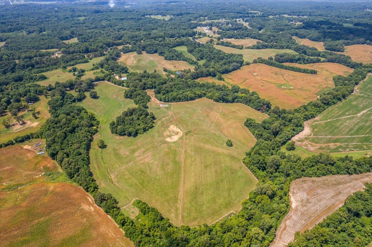 1040 Barlow Road Ripley, TN 38063 - Photo 31 of 35 an aerial view of residential houses with outdoor space