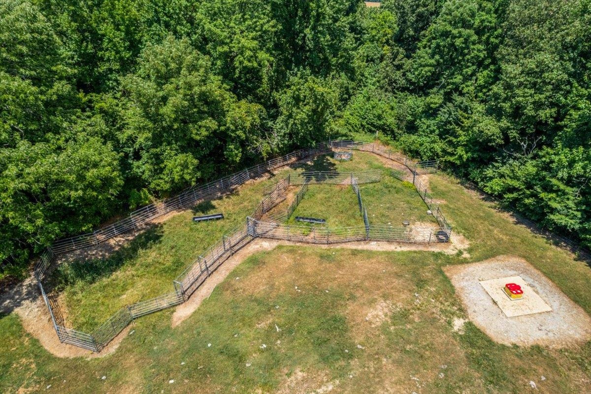 1040 Barlow Road Ripley, TN 38063 - Photo 9 of 35 a view of a yard with a garage