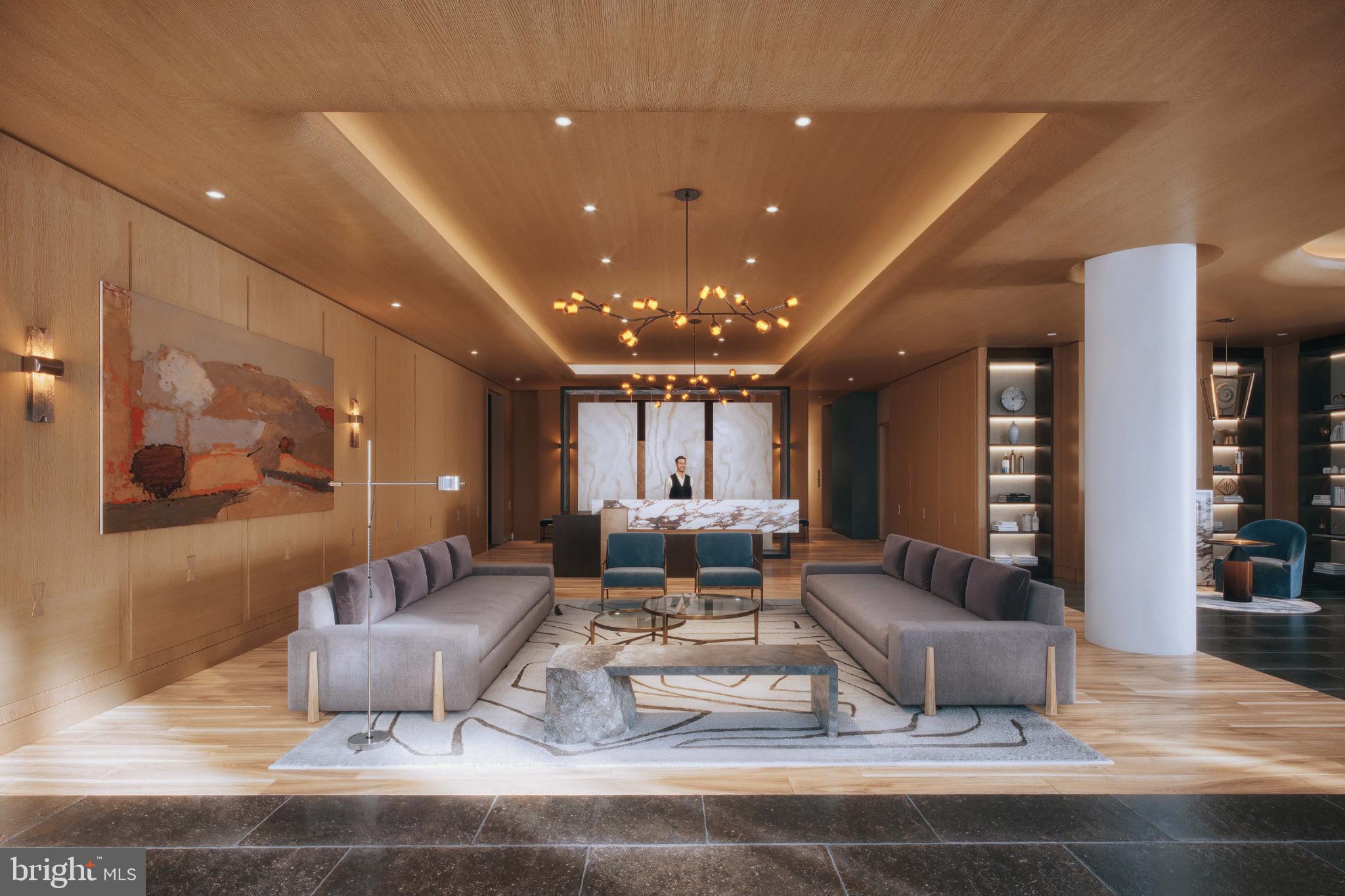1111 North Fairfax Street, Unit 304 Alexandria, VA 22314 - Photo 4 of 12 a living room with furniture and wooden floor