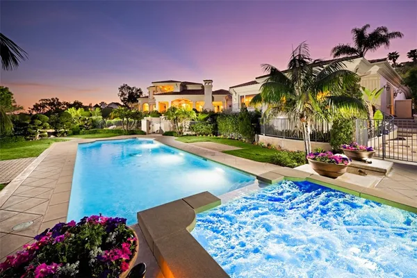 a view of a kitchen with sink washer and dryer
