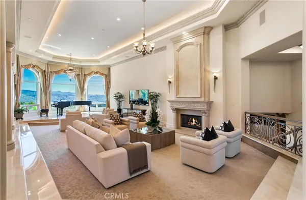 a bathroom with a glass shower door and a sink