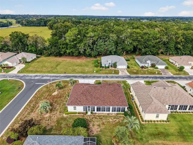 a view of swimming pool with a yard