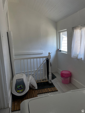 857 27th Street Ogden, UT 84403 - Photo 18 of 20 Light-filled interior space with white walls, a white beadboard ceiling, and light-toned flooring