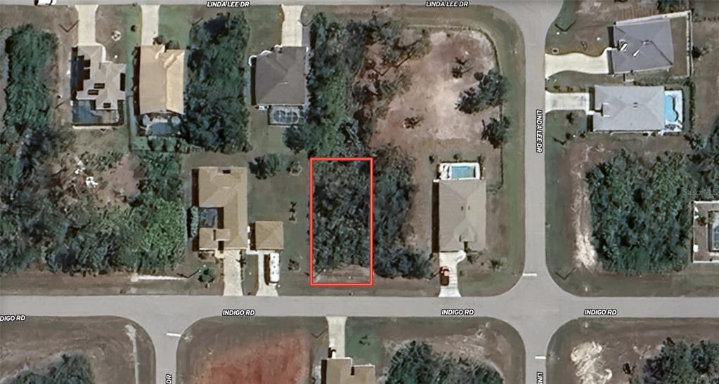 146 Indigo Road Rotonda West, FL 33947 - Photo 2 of 8 aerial view of multiple house