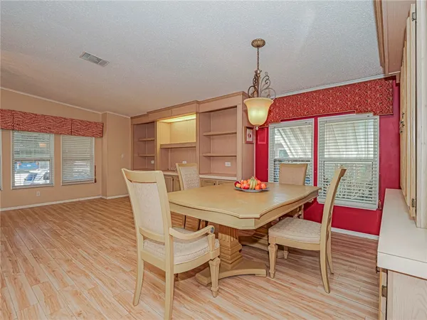 a bedroom with a bed and a closet