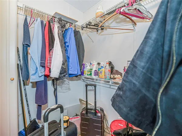 a bathroom with a sink a toilet and shower curtain