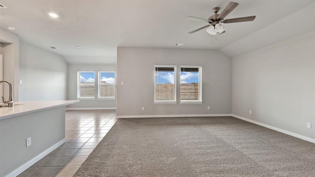 2106 Sandpiper Way Princeton, TX 75407 - Photo 10 of 39 a view of an empty room with a window