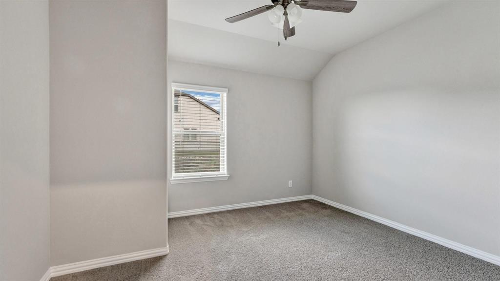 2106 Sandpiper Way Princeton, TX 75407 - Photo 21 of 39 an empty room with a window