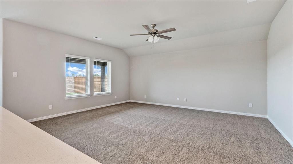 2106 Sandpiper Way Princeton, TX 75407 - Photo 29 of 39 a view of an empty room with a window