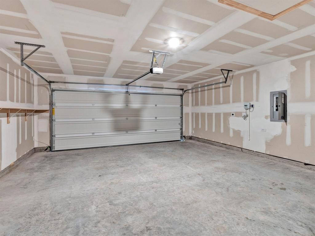 2106 Sandpiper Way Princeton, TX 75407 - Photo 33 of 39 a view of a garage