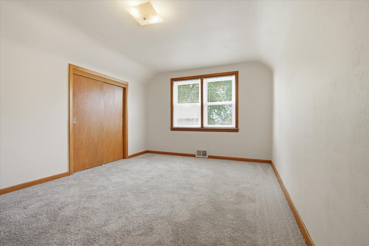 509 Smith Street Roanoke, IL 61561 - Photo 19 of 28 an empty room with windows