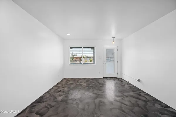 an empty room with windows