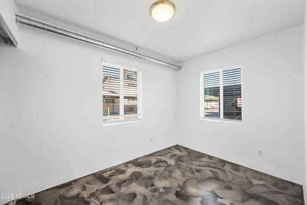 a view of a room that has a window in it