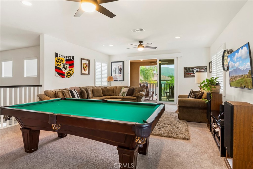 12528 Locke Circle Riverside, CA 92503 - Photo 19 of 46 a room with furniture and a large window