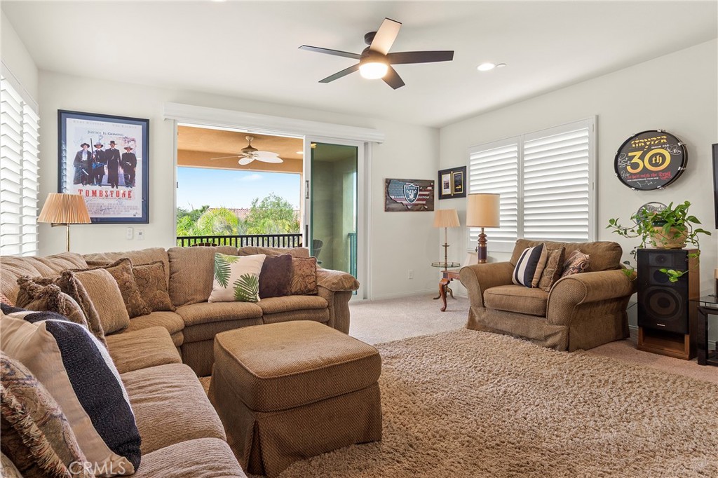 12528 Locke Circle Riverside, CA 92503 - Photo 22 of 46 a living room with furniture and a window