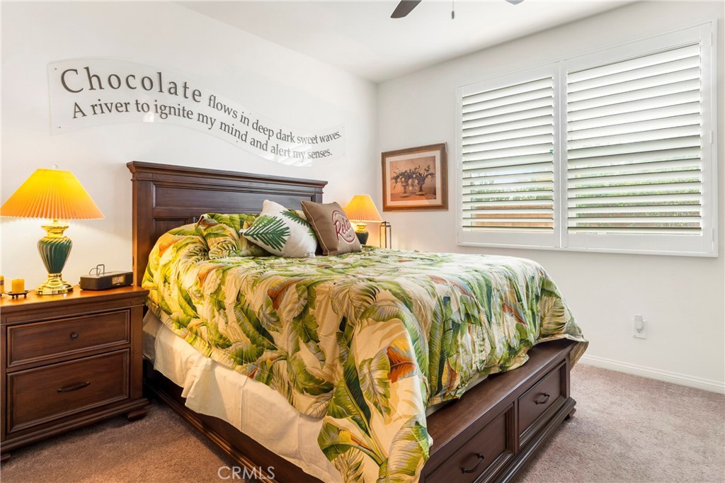 12528 Locke Circle Riverside, CA 92503 - Photo 26 of 46 a bed sitting in a bedroom next to a window