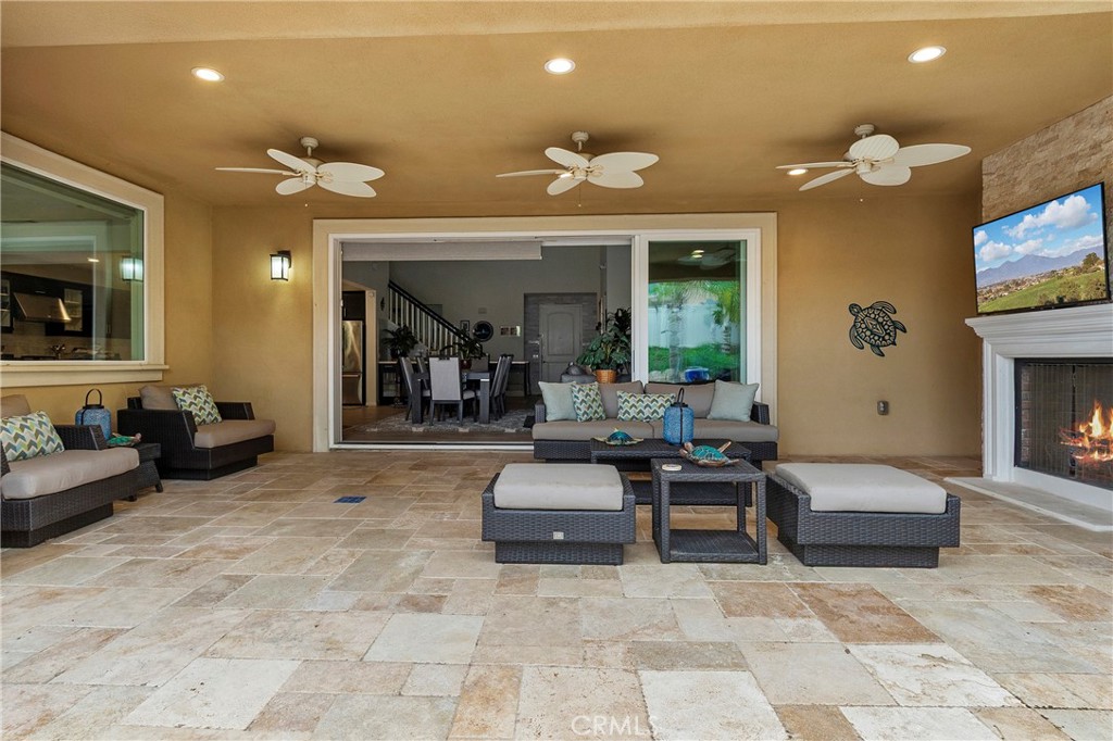 12528 Locke Circle Riverside, CA 92503 - Photo 32 of 46 a living room with furniture and a fireplace