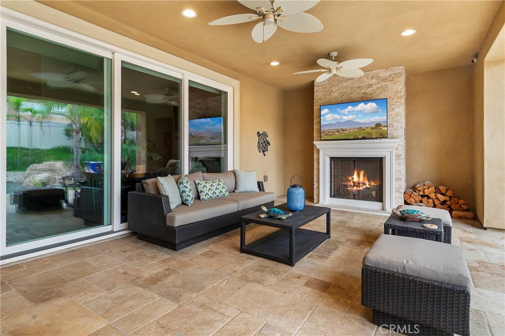 12528 Locke Circle Riverside, CA 92503 - Photo 33 of 46 a living room with furniture and a fireplace