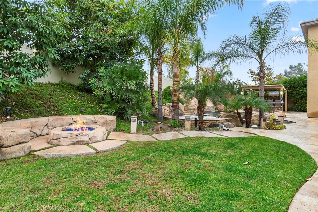 12528 Locke Circle Riverside, CA 92503 - Photo 41 of 46 a view of a backyard with a patio