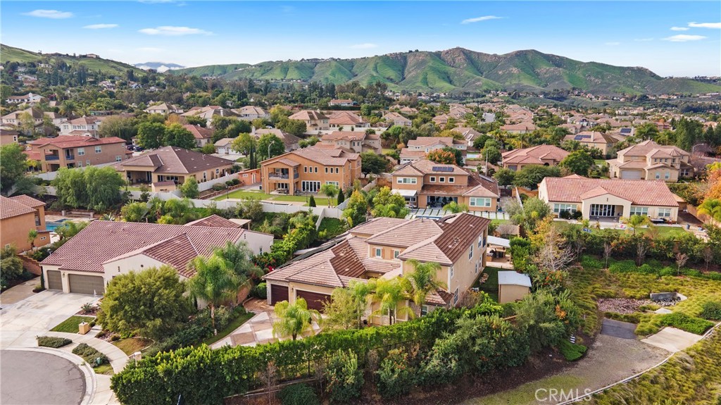 12528 Locke Circle Riverside, CA 92503 - Photo 43 of 46 an aerial view of residential houses with outdoor space and trees