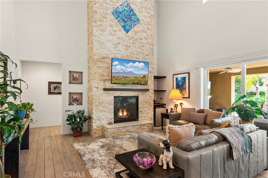 12528 Locke Circle Riverside, CA 92503 - Photo 8 of 46 a living room with furniture and a fireplace