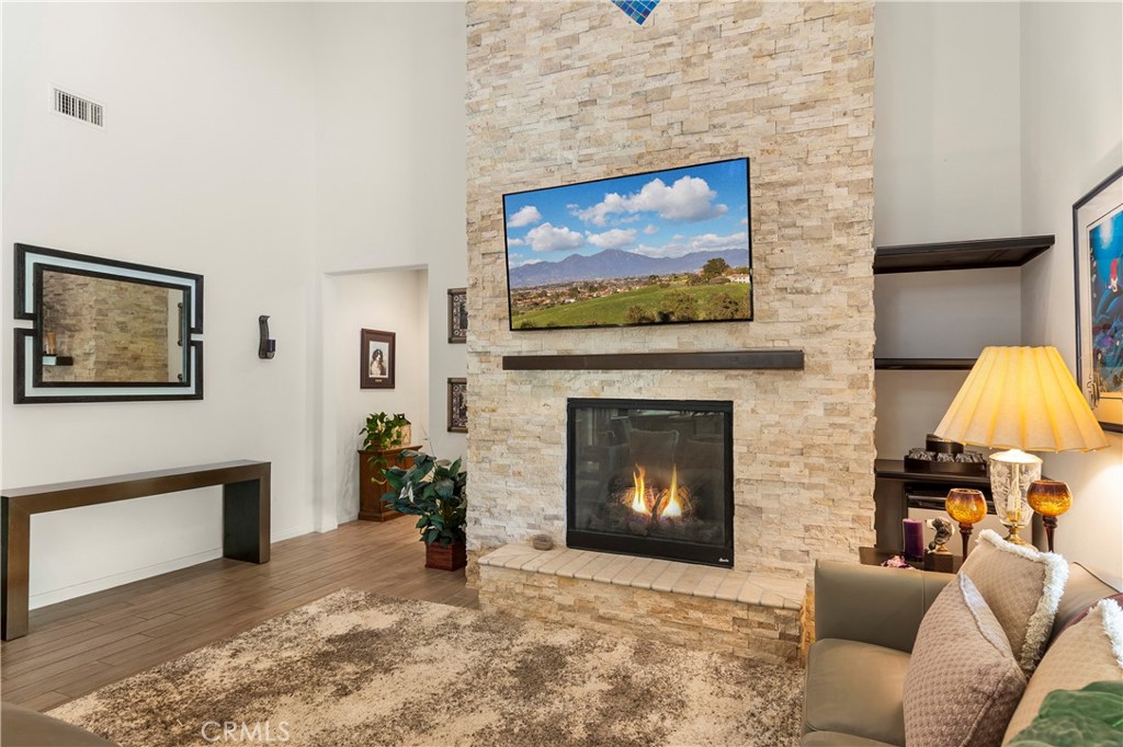 12528 Locke Circle Riverside, CA 92503 - Photo 9 of 46 a living room with furniture and a fireplace