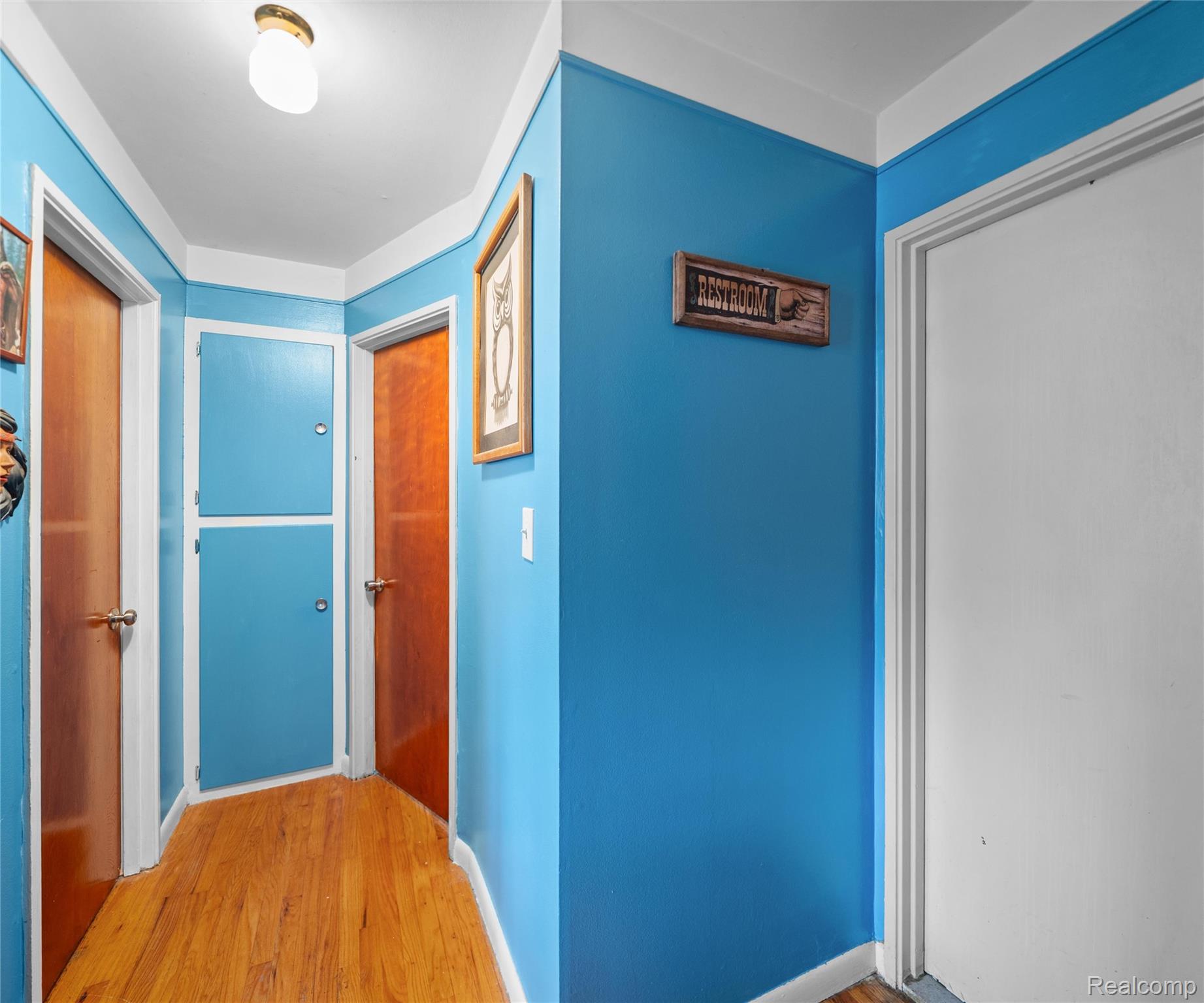 28940 Grandview Street Inkster, MI 48141 - Photo 8 of 41 Hall featuring wood finished floors and baseboards