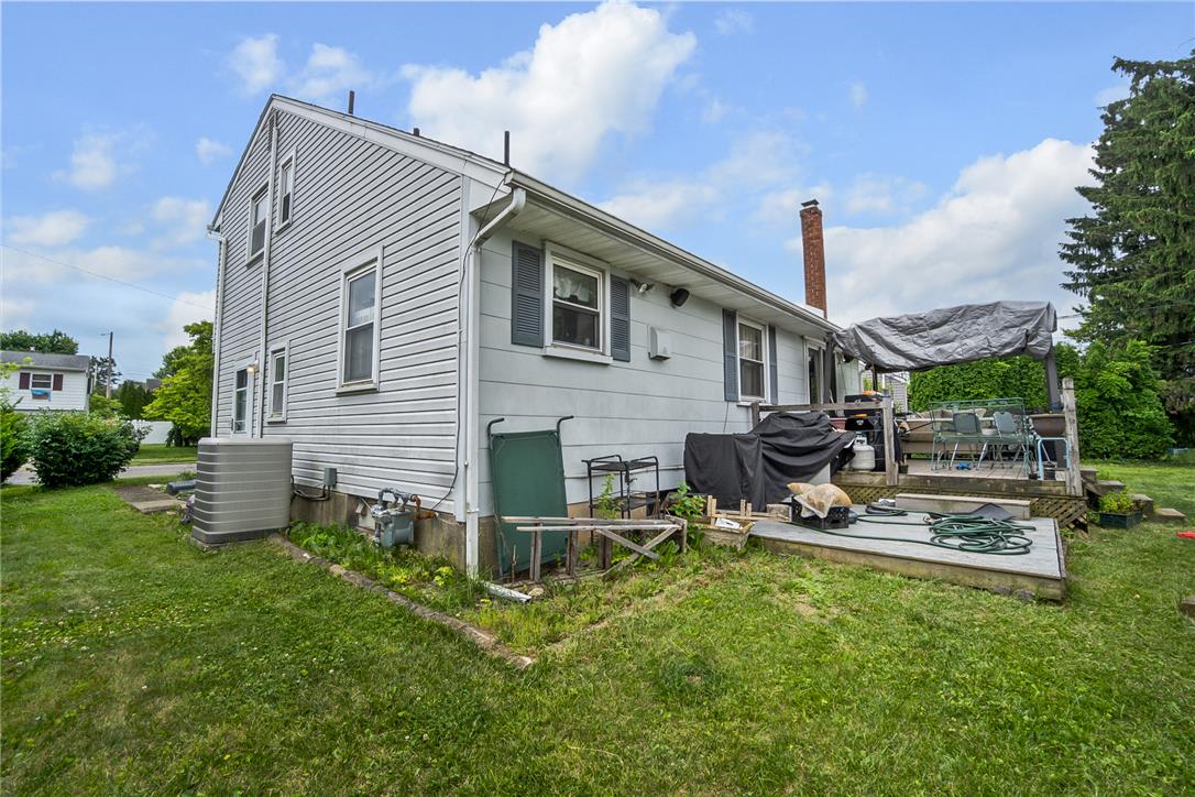 3031 Shakespeare Road Bethlehem, PA 18017 - Photo 26 of 30 A well-maintained lawn embraces this residence, complemented by a welcoming outdoor deck perfect for gatherings.