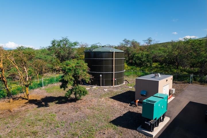 7191 Makena Road Kihei, HI 96753 - Photo 20 of 20 a backyard of a house with table and chairs